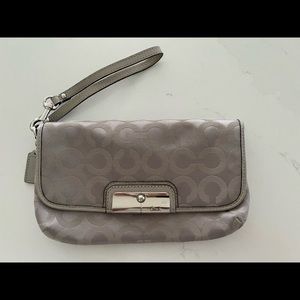 Coach wristlet. Beautiful gray with shiny fabric
